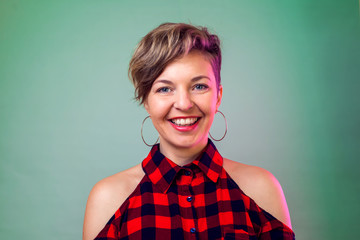 People and emotions - smiling young woman with short hair