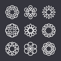 Flower design elements in trendy linear style, vector floral icons and elegant lineart monograms