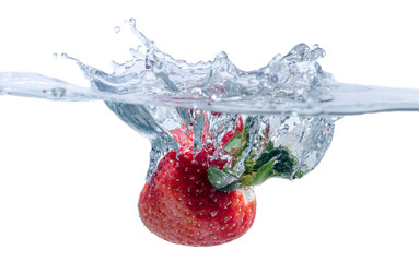 Isolated Strawberry Splashing into Water