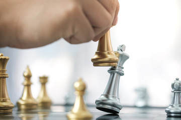 Businessman play with chess game. success management concept of business strategy and tactic challenge.
