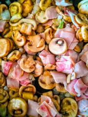Obraz na płótnie Canvas Ariel view of food with mushrooms, bacon and onion