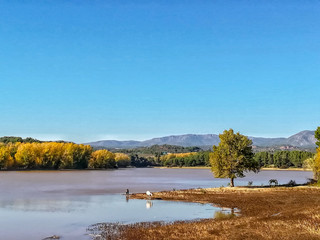 View of Puebla reservoir with mountains in the background