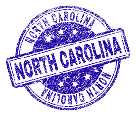 NORTH CAROLINA stamp seal watermark with grunge style. Designed with rounded rectangles and circles. Blue vector rubber print of NORTH CAROLINA tag with grunge texture.