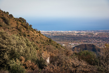 Fototapeta na wymiar view of the valley at the foot of the Etna volcano, in the background the bay of Catania