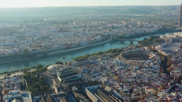 Aerial view of Seville, famous European historic city and capital of Andalusia, (corrida bullring) bullfighting arena (Plaza de toros de la Real Maestranza de Caballeria de Sevilla) - Spain, Europe