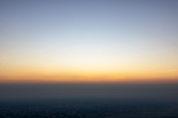 Obraz premium Sunrise at the morning viewpoint on Phra That Doi Suthep Temple Below is Chiang Mai city.