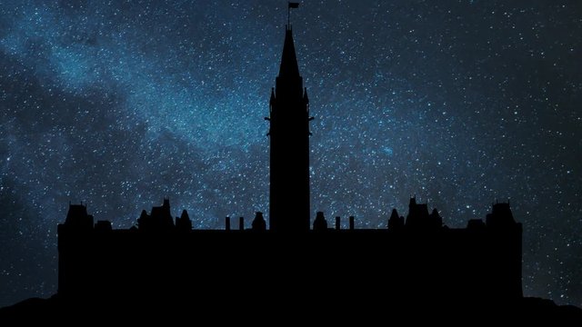 Parliament Hill (Colline du Parlement) and Its Gothic revival suite of Buildings in Silhouette by Night with Stars and Milky Way in Background, Ottawa, Ontario, Canada