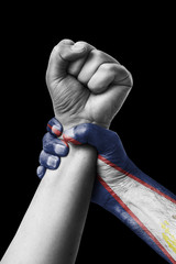 Fist painted in colors of American samoa flag, fist flag, country of American samoa