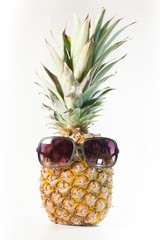 funny pineapple with sunglasses isolated on white