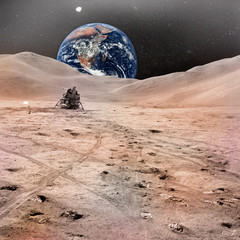 Naklejka premium Lunar Module photographed against lunarscape, lunar surface extravehicular, with human footprints and planet Earth in the sky. Elements of this image furnished by NASA.