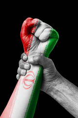 Fist painted in colors of Iran flag, fist flag, country of Iran