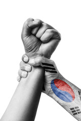 Fist painted in colors of Korea south flag, fist flag, country of Korea south