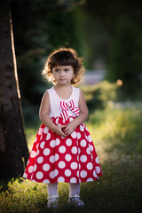 little girl in red dress