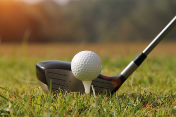 Golf club and golf ball close up in golf coures at Thailand