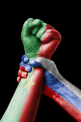 Russia VS Burkina faso, Fist painted in colors of Burkina faso flag, fist flag, country of Burkina faso