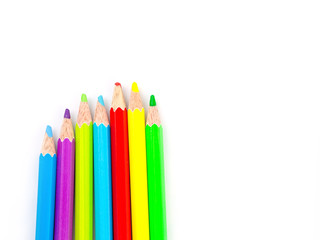 Fototapeta premium Multicolored pencils with free space for text on white background, Color pencils isolated