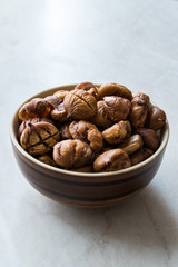 Peeled Roasted Raw Organic Chestnuts in Bowl.