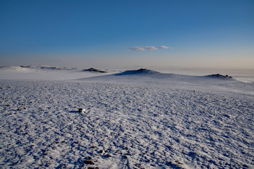 Fototapeta na wymiar Western Mongolia. Highlands near the city of Altai after a night snow storm.