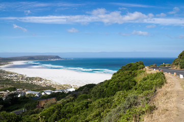 Fototapeta na wymiar The end of Chapman's Peak Drive. Beautiful panorama view of Noordhoek Beach, South Africa.