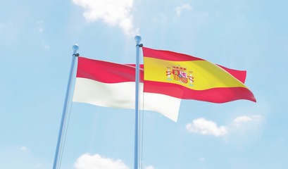 Fototapeta na wymiar Spain and Indonesia, two flags waving against blue sky. 3d image