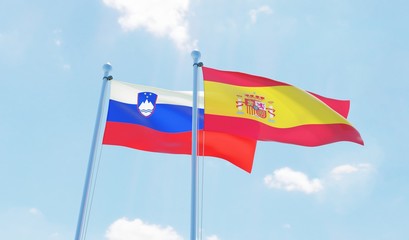 Spain and Slovenia, two flags waving against blue sky. 3d image