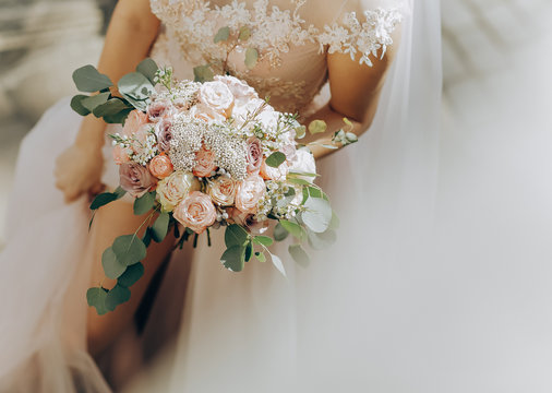 Beauty wedding bouquet in bride's hands. Wedding day