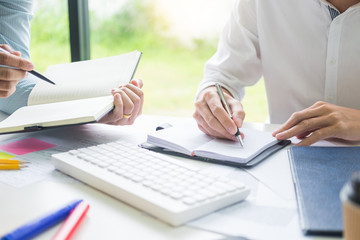 Group of diverse young adults university tutor presentation work information student on laptop discussing data, education concept.