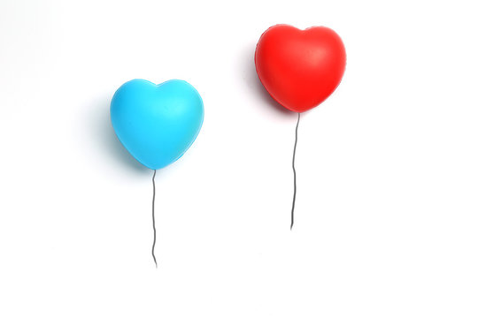 color rubber hearts balloons creative photography isolated on white background,Valentine's Day concept