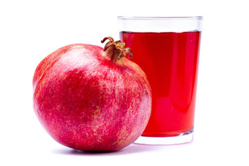 Glass of fresh healthy pomegranate juice, ripe pomegranate isolated on white background