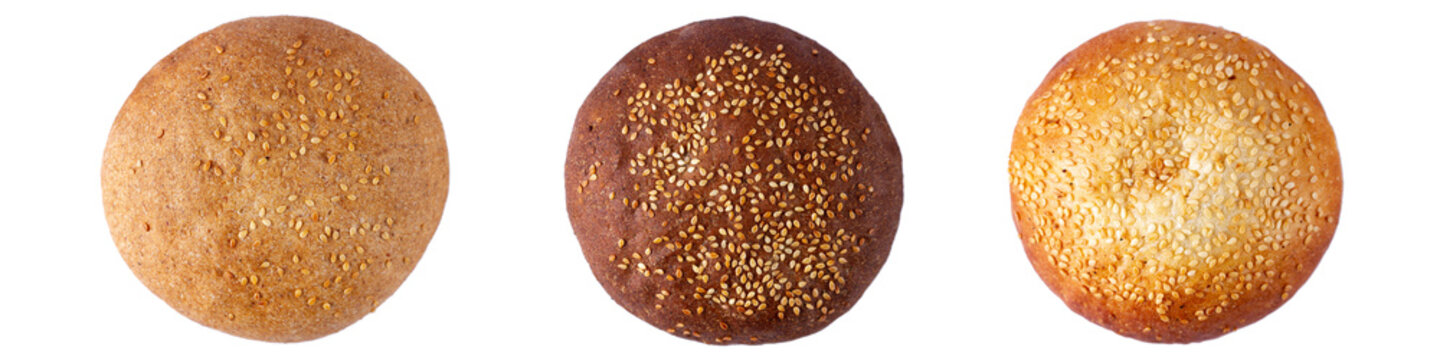 Set of freshly baked round sesame buns isolated on white background. Flour and bakery products