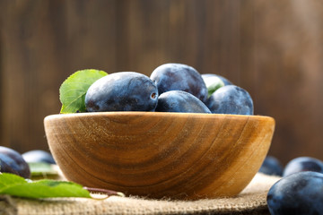 ripe plums on the table