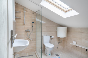 Interior of a bathroom with window in a private studio
