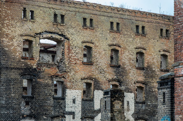 City ruins, old brick building in a state of decay.