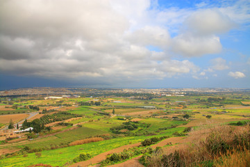 Fototapeta na wymiar The end of the thunderstorm over the valley near the ancient city of Mdina in Malta.