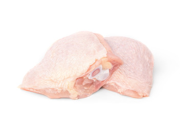 Raw chicken thigh isolated on white background.