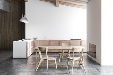 White kitchen with fireplace