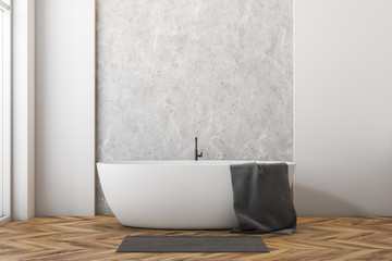 White bathroom with bathtub