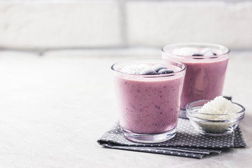 Frozen cherry coconut smoothie. Selective focus, space for text.