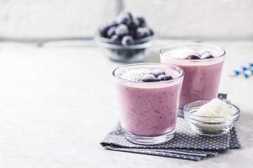 Frozen cherry coconut smoothie. Selective focus, space for text.
