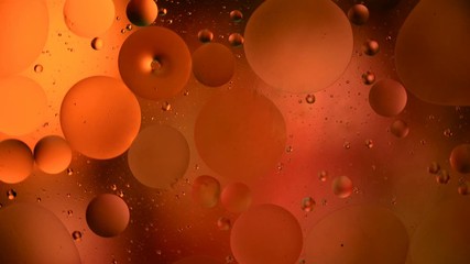 water drops on glass with purple and pink background, close-up - Powered by Adobe