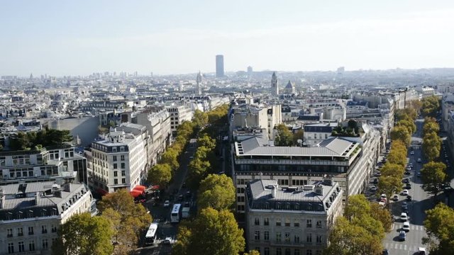 Aerial view of Paris autumn cityscape with Eiffel Tower in smoke fog, France