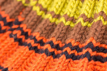 Knitting. Background knitted texture. Bright knitting needles.