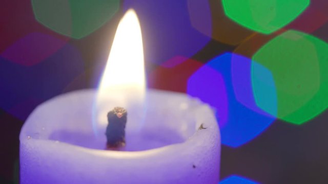 22335_The_light_on_the_candle_on_a_macro_shot.mov