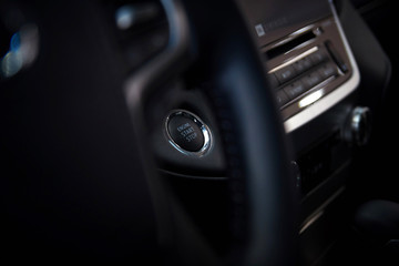 engine start stop button in the car interior