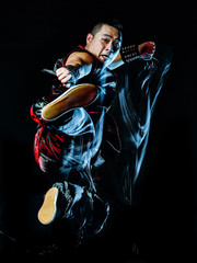 whushu chinese boxing kung fu Hung Gar fighter isolated man isolated on black background with speed light painting effect motion blur