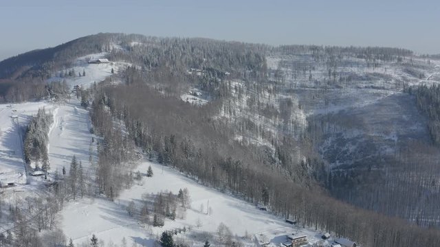 Winter scenery in Silesian Beskids mountains. View from above. Landscape photo captured with drone. Poland, Europe. 