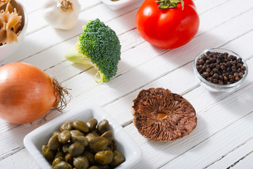 mediterranean food ingredients on white wooden
