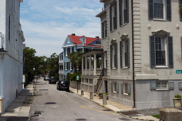 Old houses on the streets in the summer sunny day. Charleston, South Carolina / USA - July 21, 2018