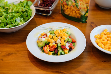 fresh salad with cheese for a healthy and hip diet