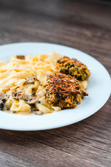 Paste Carbonara on a plate with falafel